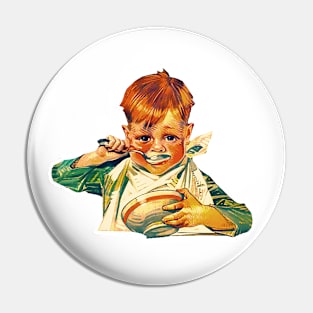 Red-haired boy eating Pin
