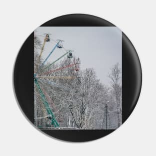 Old ferris wheel in snow Pin