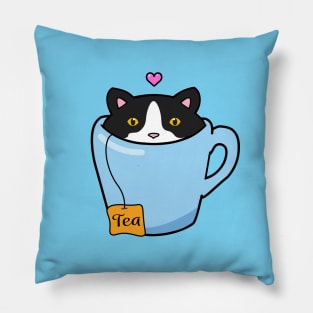 Sweet tuxedo cat sitting in a blue cup of tea Pillow