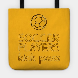 Soccer players kick pass Tote