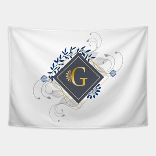 G, blue and gold initial monogram. Tapestry