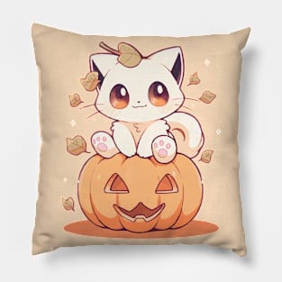 White kitten sitting on a pumpkin Pillow