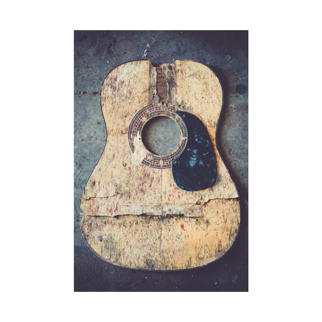 Broken acoustic guitar by Juhku