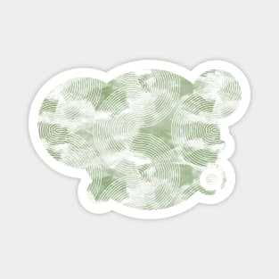 White curves on green blob Magnet