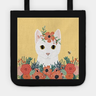 The cute white cat queen is watching you from the flowerbed Tote