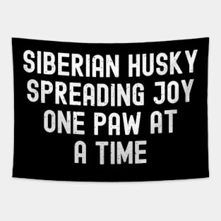 Siberian Husky Spreading Joy, One Paw at a Time Tapestry