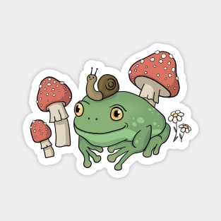 A Cute Cottagecore Aesthetic with a Frog Wearing a Snail Hat and Mushroom Magnet