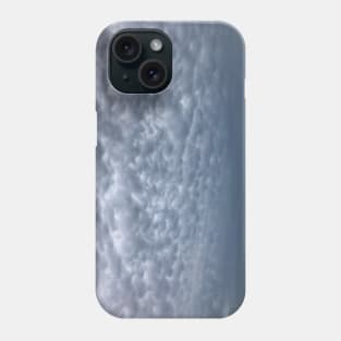 Under cloudy heavenly sky. Blue grey cumulus cloudscape Phone Case