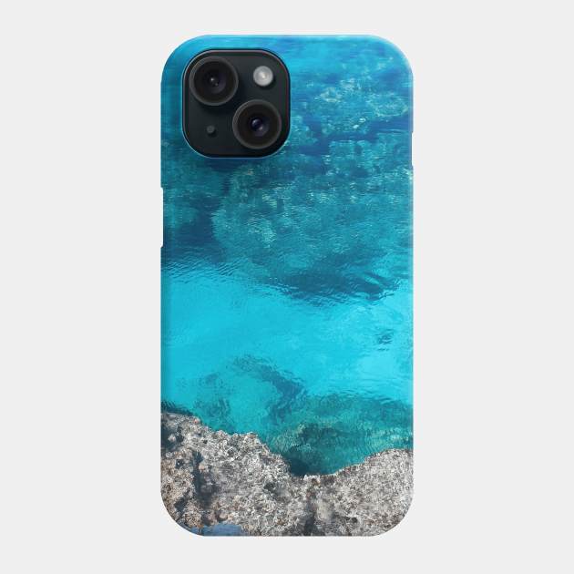 Crystal clear blue ocean water Phone Case by angiepaszko