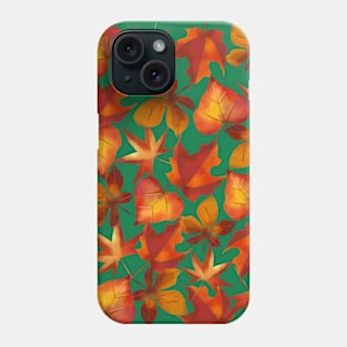 Autumn leaves on green background Phone Case