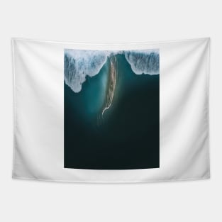 Minimalist surreal glowing wave hitting a dark beach – Landscape Photography Tapestry