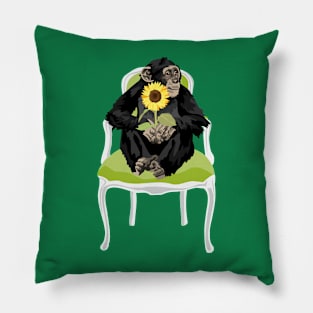 Chimp in a chair with a sunflower Pillow