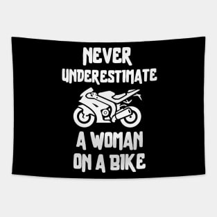 Never underestimate a woman on a bike Tapestry