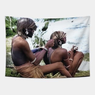 colorized vintage photo of Maasai doing hair Tapestry