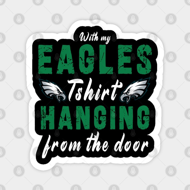 With My Eagles Tshirt Hanging From The Door Magnet by Ksarter