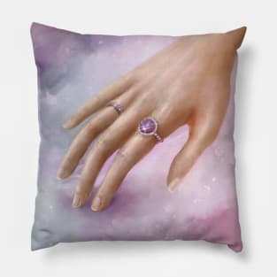 Female Hand With Purple Rings Touching a Soft Purple Fabric Pillow