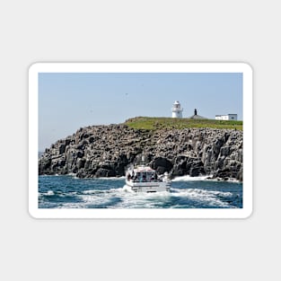 Tour boat visiting the bird colonies on the Farne Islands, Northumberland, UK Magnet