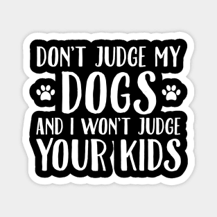 Don't judge my dogs and I won't judge your kids Magnet