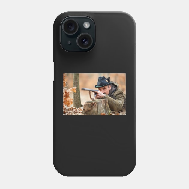 Hunter with gun in the forest Phone Case by naturalis