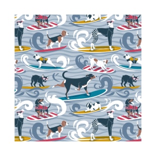 Happy dogs catching waves // pattern // pastel blue background darker blue waves brown white and blue doggies yellow red and turquoise surf and bodyboards T-Shirt