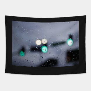 Urban traffic lights through wet glass Tapestry