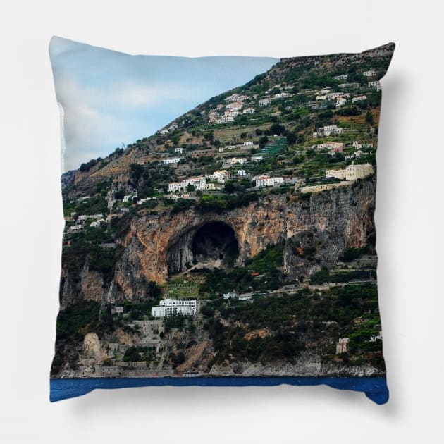 Panorama in Amalfi coast with a mountain scattered with buildings and a huge cavern in the middle Pillow by KristinaDrozd
