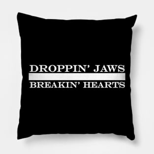 dropping jaws breaking hearts Pillow