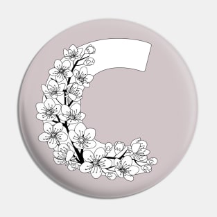 Monochrome capital letter C patterned with sakura twig Pin