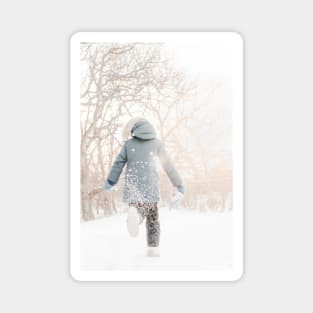Child running in snow, backlight and throwing snow Magnet