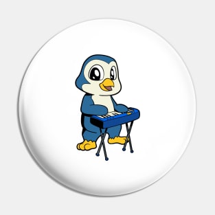 Cartoon penguin playing keyboard Pin