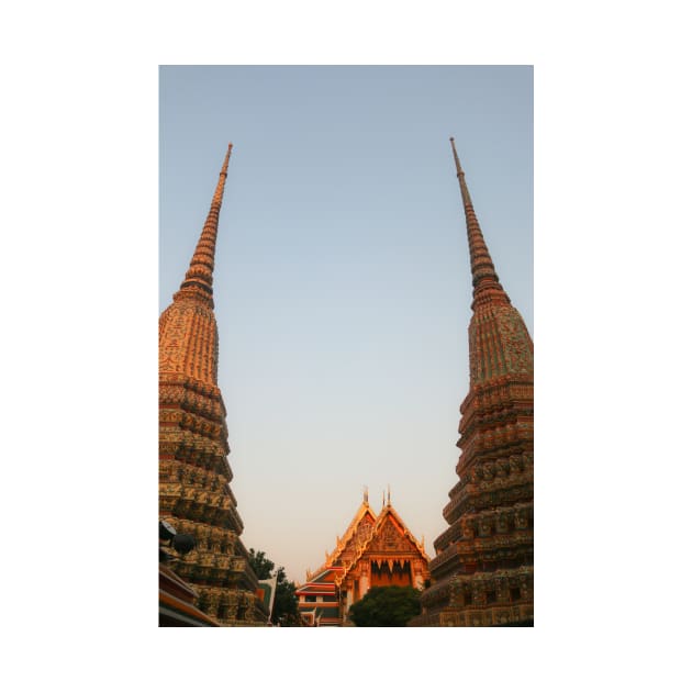 Part view from two stupa against clear sky at Wat Pho Buddha temple. by kall3bu