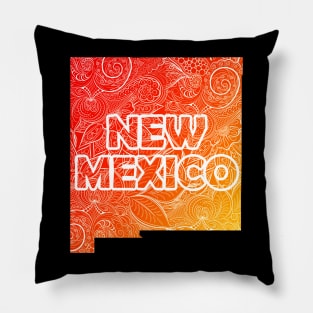 Colorful mandala art map of New Mexico with text in red and orange Pillow