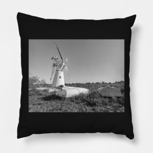 Rowing boats and windmill at Thurne Mouth in rural England Pillow