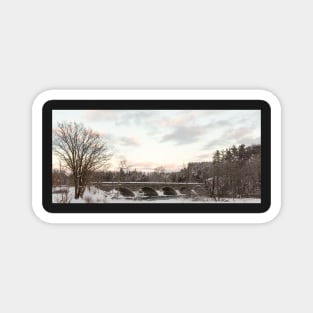 A snowy winter landscape Magnet