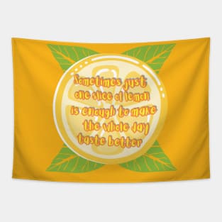 Lemon slice on green leaves with yellow lettering Tapestry