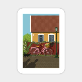 Pink bike with flowers in the Summernight in the street by the cottage in a Scandinavian country Magnet