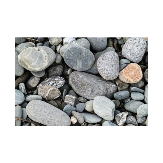 River stones in typical random pattern and type in New Zealand. by brians101