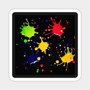 Bright coloured paint splats on a black background Magnet