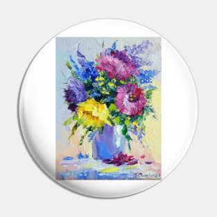 A bouquet of flowers in a vase Pin