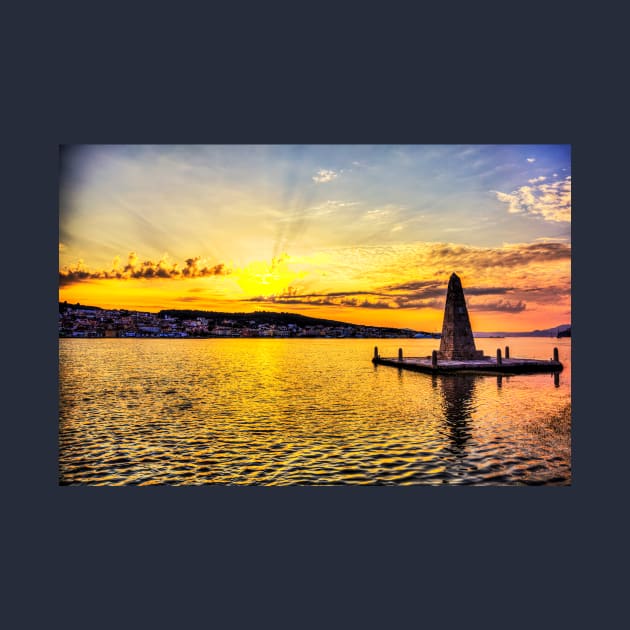 Obelisk at Drapano Bridge, and town of Argostoli behind, Kefalonia, Greece by tommysphotos