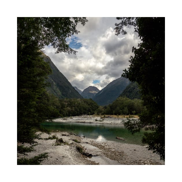 River with a View on a Mountain Framed by Trees by Danny Wanders