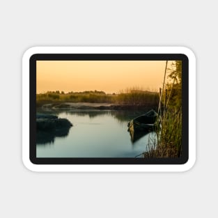 Boat on a lake. Magnet