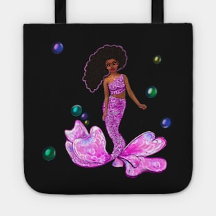 Coco the Magical rainbow mermaid with brown eyes, flowing Afro hair and caramel brown skin Tote