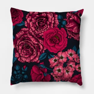 Pink, red and bi-color roses with blue leaves on black Pillow