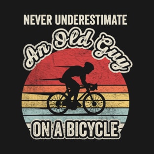 Never Underestimate An Old Guy On A Bicycle Funny Cycling Vintage Biker Cyclist Dad Gift Biker Gift Retro Bike T-Shirt