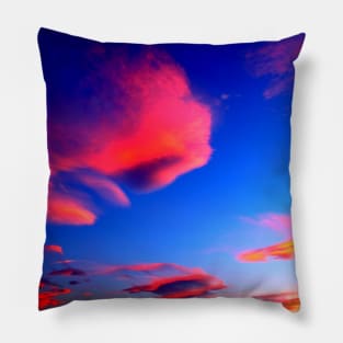 Plenty of bright pink clouds scattered on the yellow-blue sky Pillow
