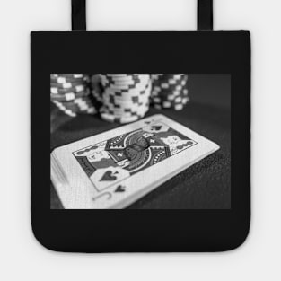 Close up of deck of cards and poker chips Tote