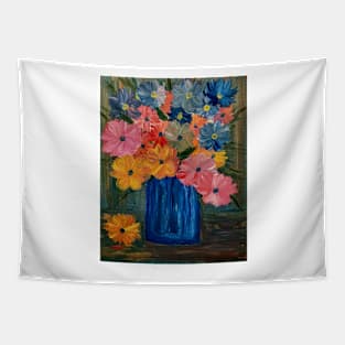 A beautiful bouquet of mixed flowers in a glass and gold vase Tapestry