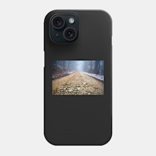 Foggy road in the forest Phone Case