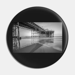 Long exposure of the pier on the sandy beach in Cromer, Norfolk Pin